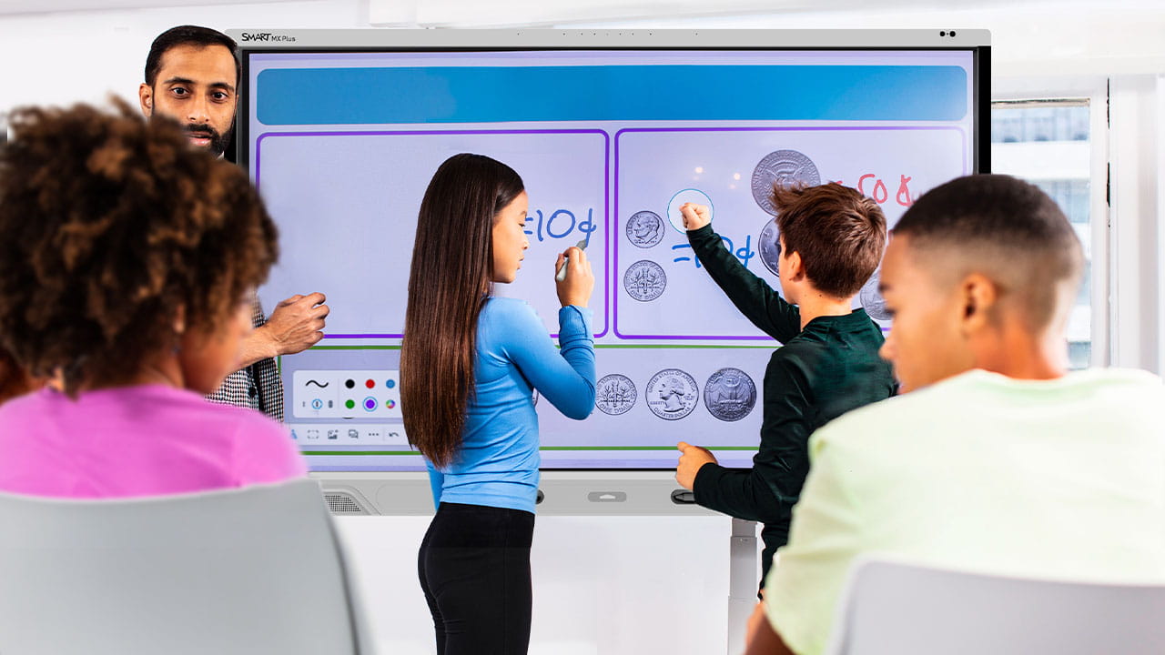 Students collaborating on math problems using a SMART Board MX Plus in a classroom setting.
